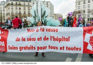 paris-france-french-hospital-personal-protest-health-and-social-issues-female-nurse-of-ned-holding-banner-no-to-the-dismantlement-of-public-health-care-secu-free-health-care-for-all-place-gambetta-paris-f